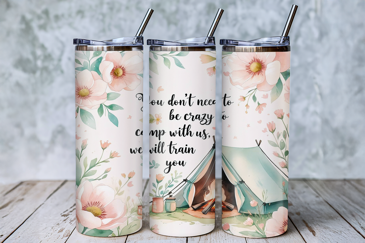 Three floral-patterned stainless steel tumblers with straws, each featuring a different design and text.