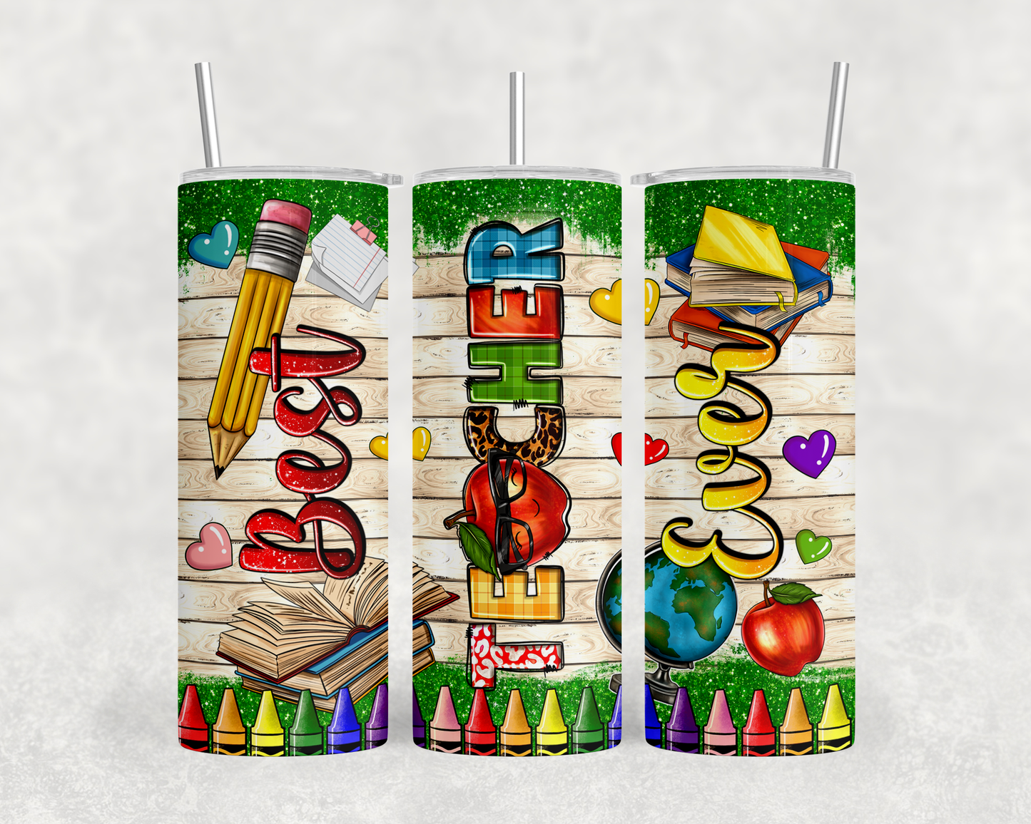 A set of three colorful tumblers with various school-related designs and text on them.