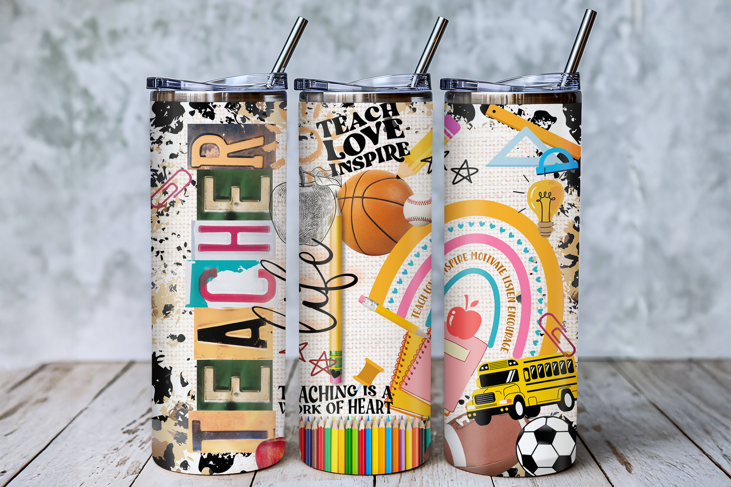 Three colorful tumblers with various school-related designs and inspirational messages printed on them.