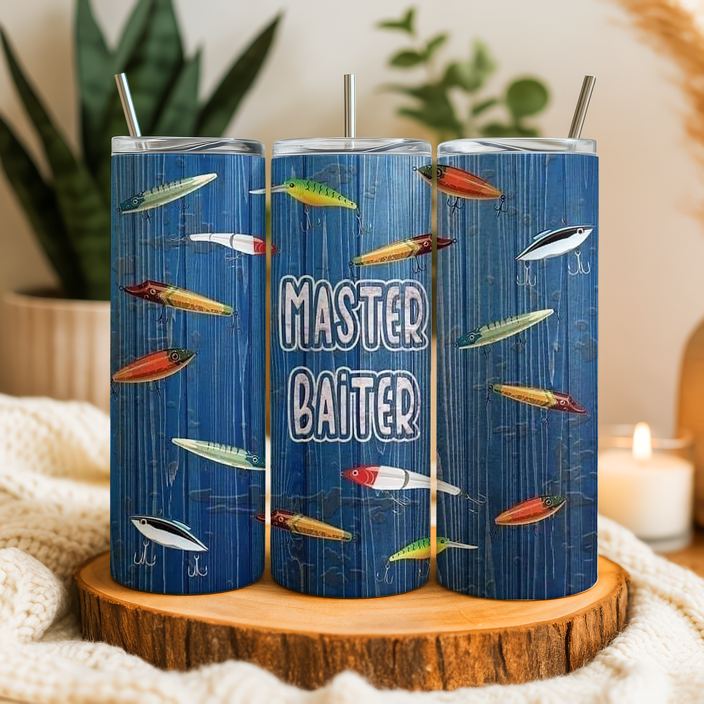 Three blue tumblers with fish illustrations and the text "MASTER BAITER" printed on them.