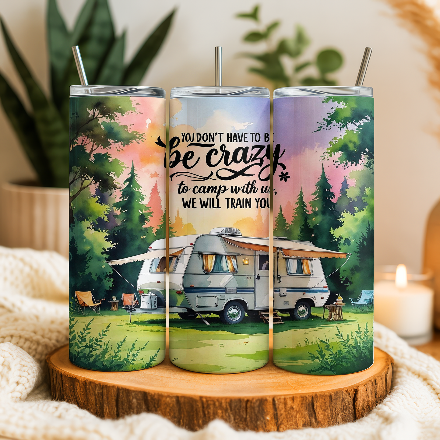 A triptych of colorful tumblers with illustrations of a camper van and camping scenes, accompanied by a motivational quote about camping and adventure.