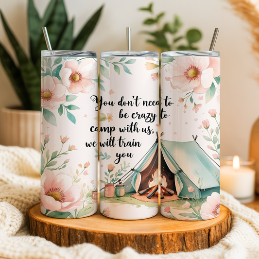 A triptych of colorful tumblers with floral designs and camping-themed illustrations. The text on the tumblers reads "You don't need to be crazy to camp with us, we will train you".