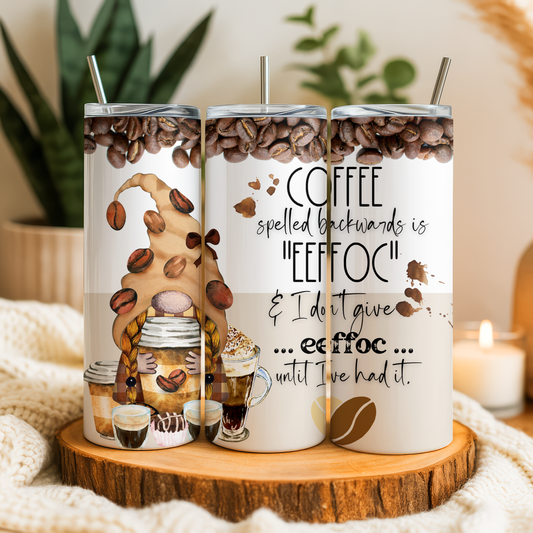 A set of three coffee-themed tumblers with whimsical illustrations and text.
