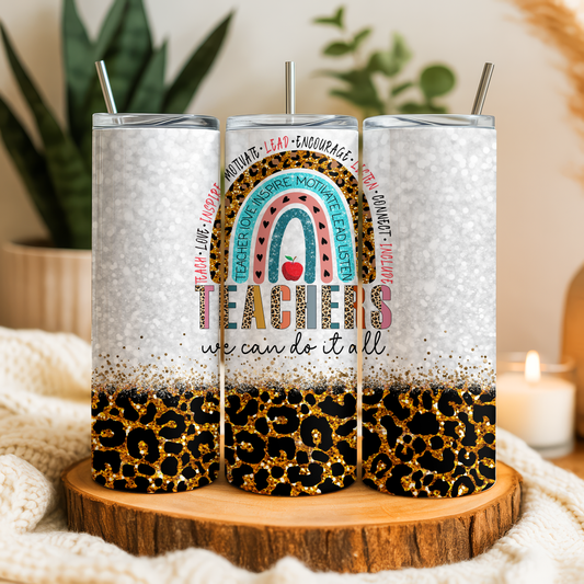 A set of three glittery tumblers with a leopard print design and a colorful graphic on the front.