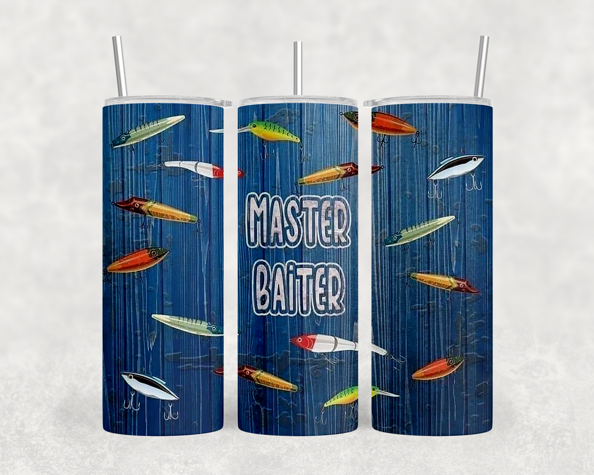 A set of three blue tumblers with a fishing-themed design. The tumblers feature various types of fish and lures, along with the text "MASTER BAITER" prominently displayed.